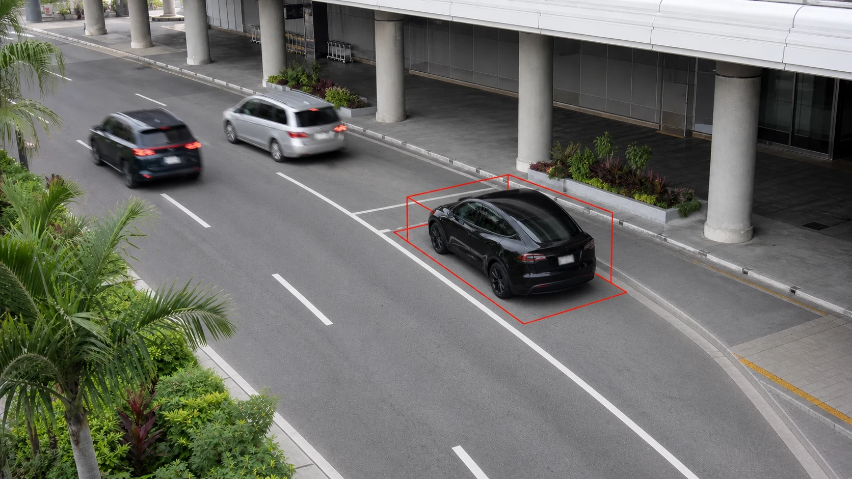 Vehicle dwell detection at an airport pickup curb