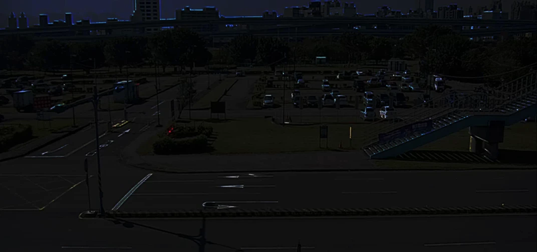 Car park under moonlight, barely visible