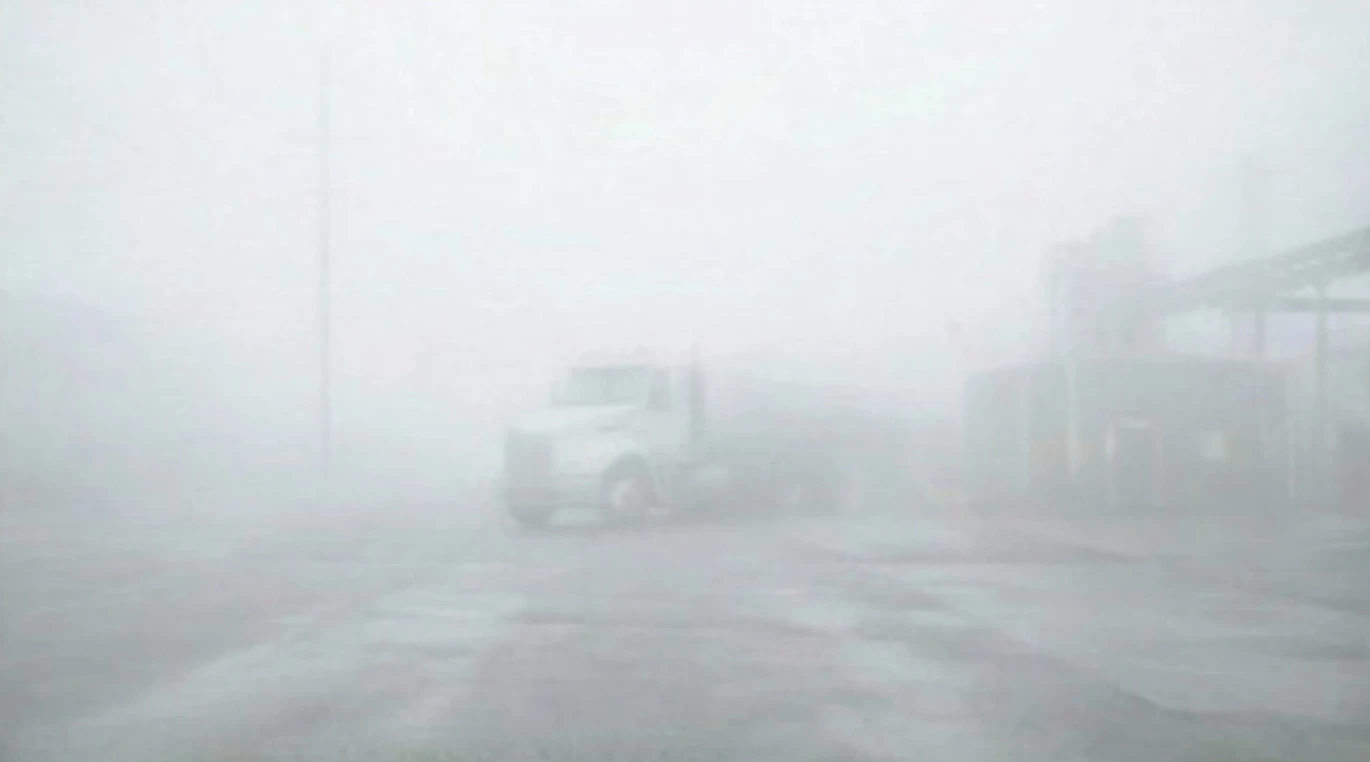 The same scene to the naked eye: a wall of fog