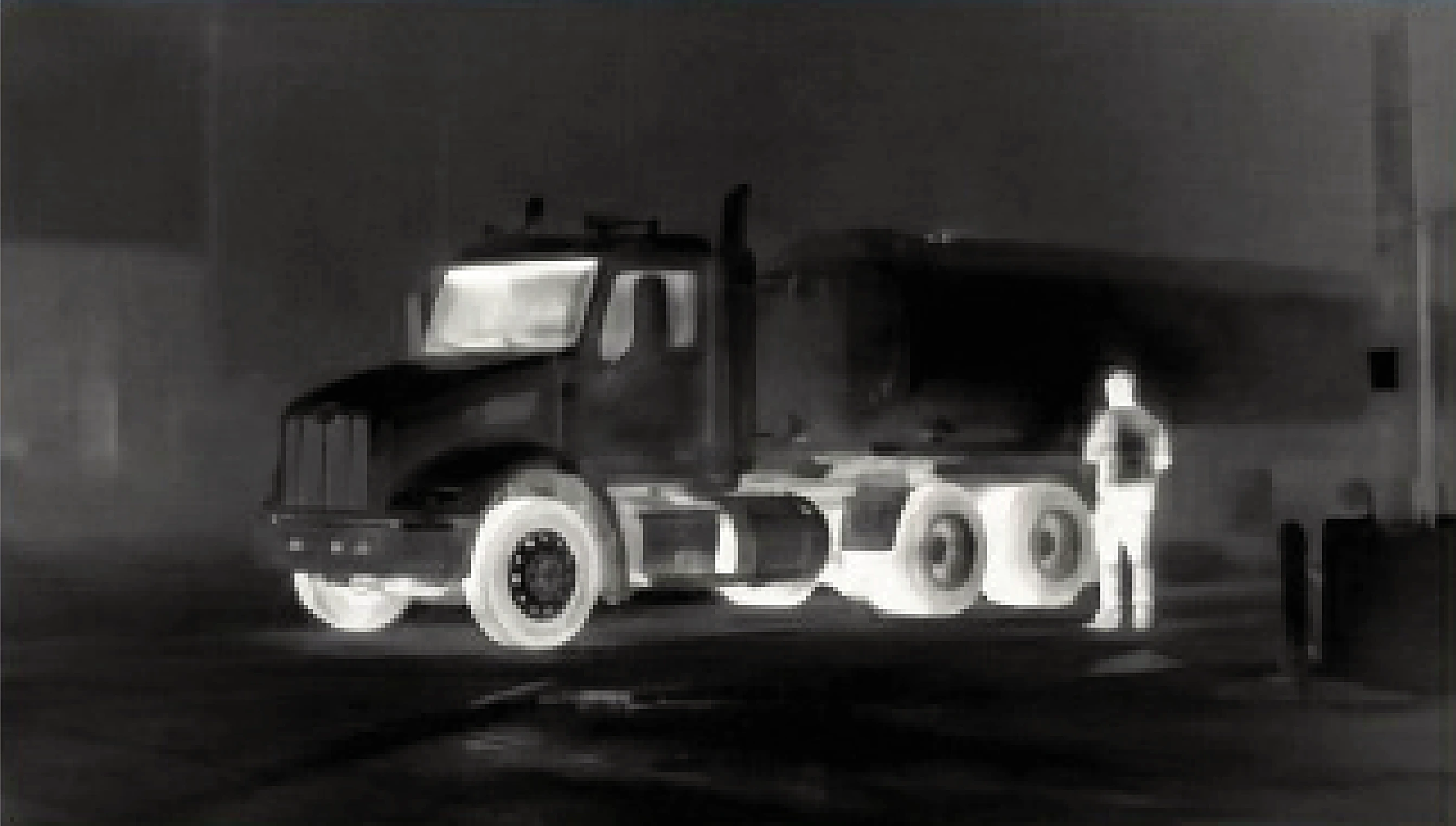 Thermal image of a truck and its driver in heavy fog
